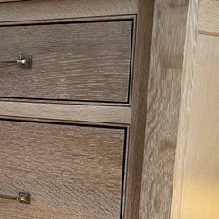 inset cabinetry with elegant wood finish and classic detailing
