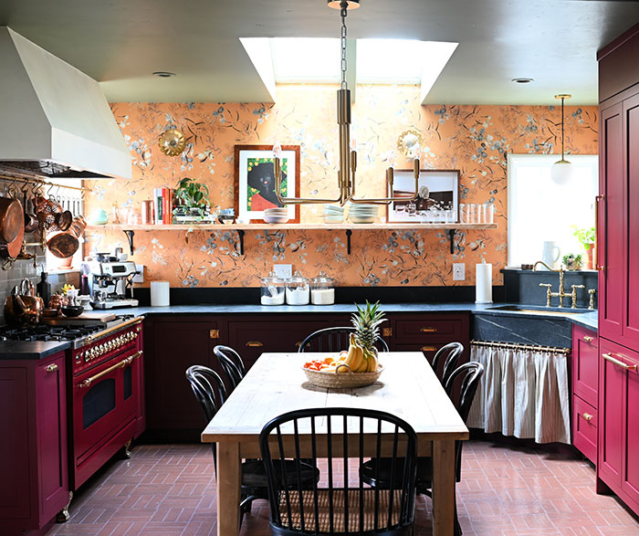 traditional dark wood kitchen cabinets with colorful backsplash